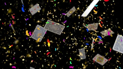 Confetti falling over playing cards during festive celebration party night Vidéo 347182585