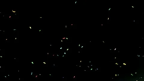 Confetti floating in the night sky Stock Footage 295156564