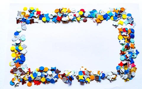 Confetti frame on a white background with text space in the middle Foto stock