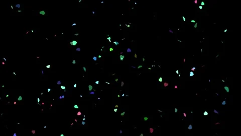 Confetti heart particles are falling from top to bottom on a black screen Stock Footage 327567709