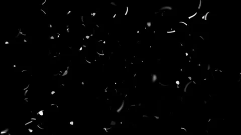 Confetti pieces falling down on black background dynamic motion Stock Footage 327594621