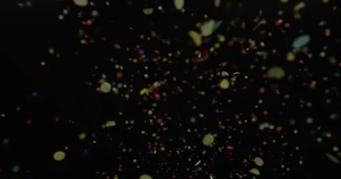 Confetti raining down closeup - varied focus (shallow, sharp, and deep) Stock Footage 74366984
