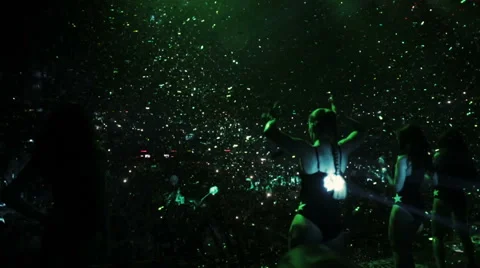 Confetti sequins falling on go go girls dancers Stock Footage 54136657