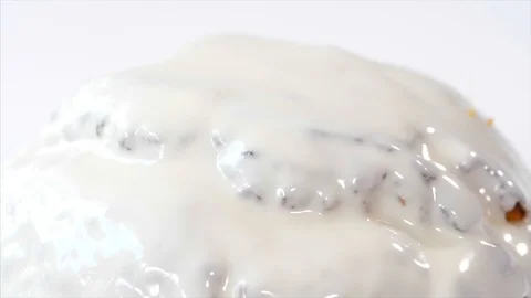 Confetti is sprinkles on top of Easter Cake with white glaze, close-up. Stock Footage 126580725