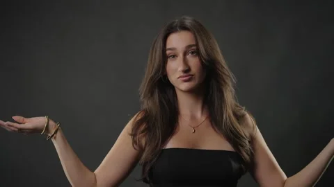 Confidence and self-esteem concept, young woman with long hair posing and Stock Footage 336939343