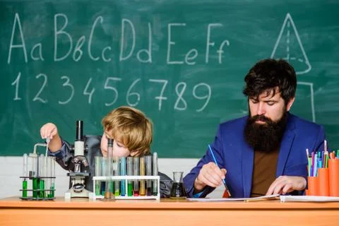 Confidence charisma. Back to school. Science chemistry concept. father and son Foto stock