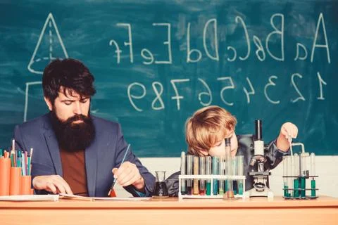 Confidence charisma. Back to school. Science chemistry concept. father and son Foto stock