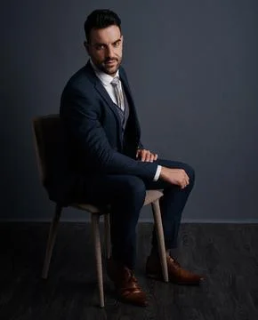 Confidence makes all the difference in business. Studio shot of a stylish young Stock Photos
