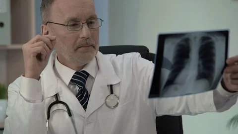 Confident and experienced pulmonologist guaranteeing fast efficient treatment Stock Footage