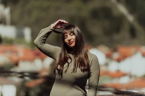 A confident and stylish plus-size woman walking by Stock Photos