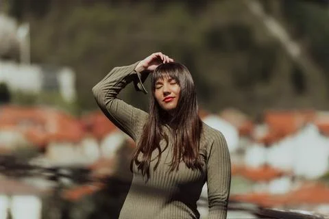A confident and stylish plus-size woman walking by Stock Photos
