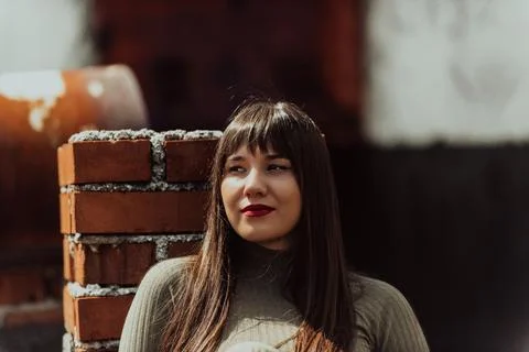 A confident and stylish plus-size woman walking by Stock Photos
