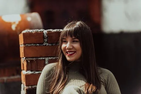 A confident and stylish plus-size woman walking by Stock Photos