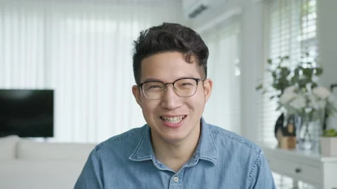 Confident asian creative man vlogger make live video conference call Stock Footage 139038064