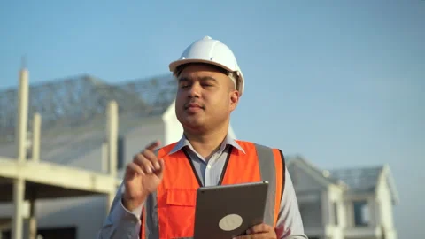 Confident asian engineer man with tablet for walking checking and maintenance. Stock Footage 240105371