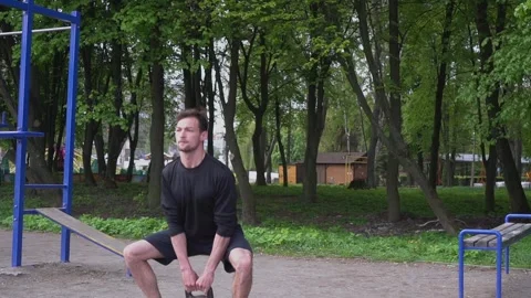 Confident Athletic Young Man Working Out With Kettlebell Fitness. Crossfit Theme Stock Footage 130346683
