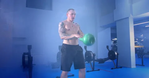 Confident Athletic Young Man Working Out With Kettlebell Fitness Center Stock Footage 137859887