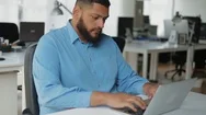 Confident Bearded Brunet Working With Laptop At Modern Office. Stock Footage