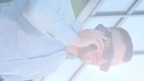 Confident bearded executive manager having a phone conversation on the phone Stock Footage 250028924