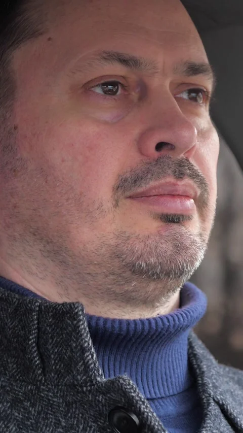 Confident bearded man driving car automobile closeup face. Pensive male driver Stock Footage 278492665