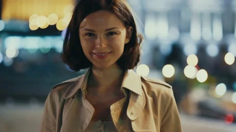 Confident beautiful woman looking at camera walking outdoors. Natural beauty Stock Footage 156458762