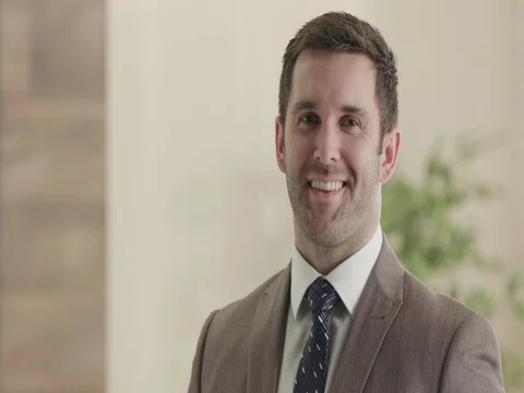 Confident business man looking into camera. Stock Footage 74152417