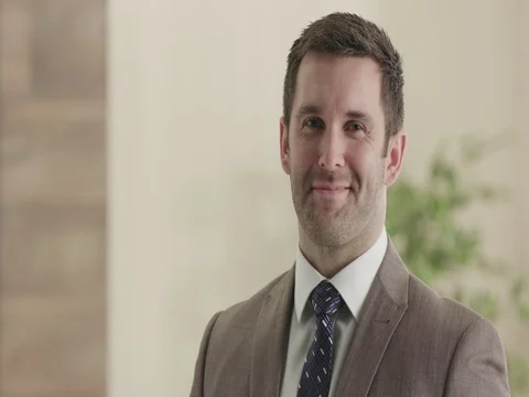 Confident business man looking into camera. Stock Footage 74152576