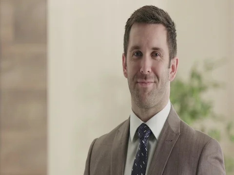 Confident business man looking into camera. Stock Footage 74152986