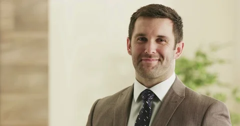 Confident business man looking into camera. Stock Footage 92174692