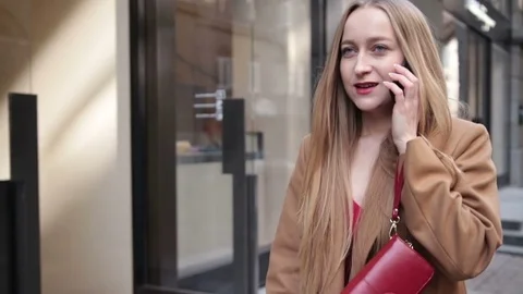 Confident business woman talking on mobile phone Stock Footage