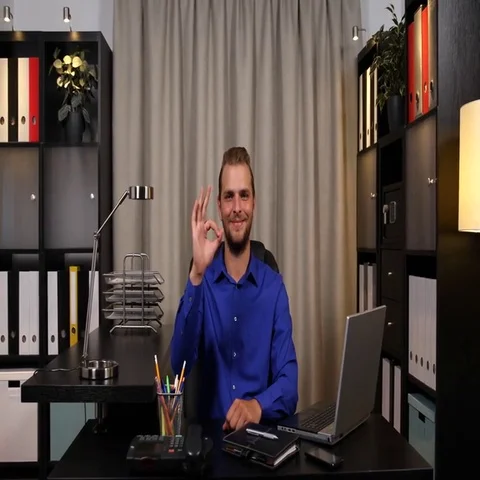 Confident Businessman Looking Camera Presentation Ok Sign in Office Meeting Room Video stock 69724970