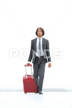 Confident businessman with Luggage. Stock Photos