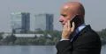 Confident Businessman Mobile Talking Financial Deal Office Buildings Background 4k or 4k+ Resolution