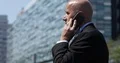 Confident Businessman Phone Talking Financial Discussion Office Building 4k or 4k+ Resolution