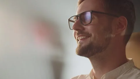 Confident businessman smiling when read funny message in corporate chat. Slow Stock Footage 274029122