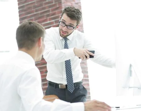 Confident businessman solves work problems 库存照片