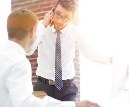 Confident businessman solves work problems 写真素材