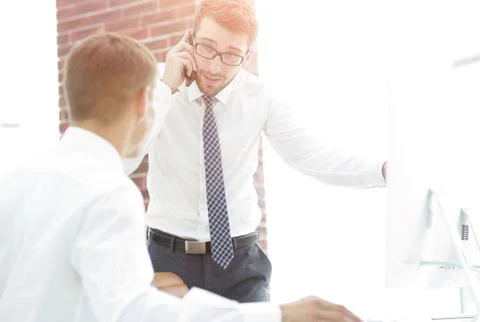 Confident businessman solves work problems 库存照片