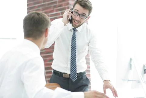 Confident businessman solves work problems 库存照片