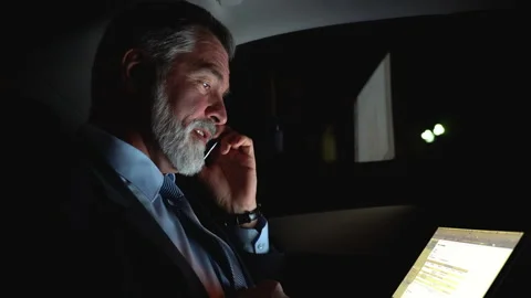 Confident Businessman talking on Phone while traveling in Business Class Car Stock Footage 162583585