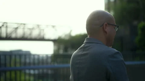 Confident businessman using smartphone to communication of business strolls. Stock Footage 243245261