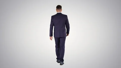 Confident businessman walking on gradient background. Stock Footage 114697107