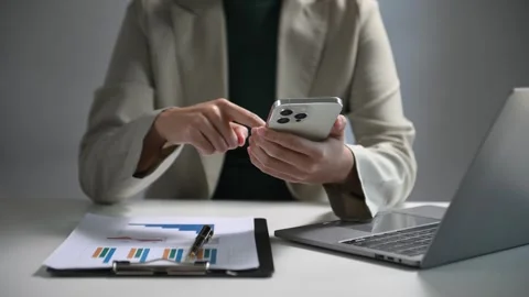 Confident businessman working on laptop,tablet and smartphone at her workpl.. Video stock 252183272