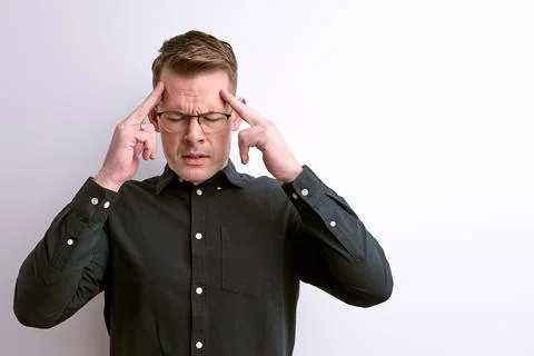 Confident Caucasian Guy Try to Remember, Concentrated On Thoughts Stock Photos
