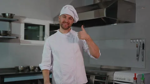 Confident Chef Standing in Commercial Kitchen Video stock 299660948
