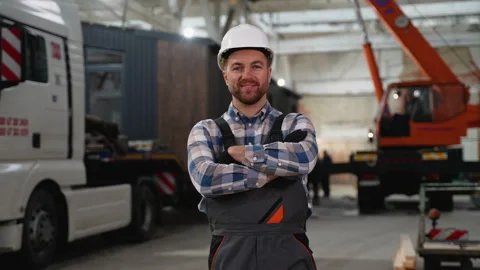 Confident construction worker at modular home loading site Stock Footage 301823868
