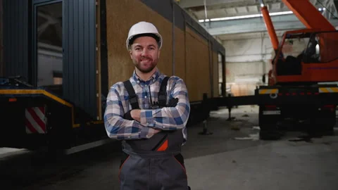 Confident construction worker at modular home factory Stock Footage 301826376