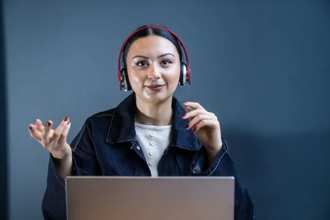 Confident Customer Support Agent Providing Online Assistance and Communicatio Stock Photos