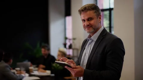 Confident data analytics new team member man browsing gadget. Businessman Stock Footage 251567075