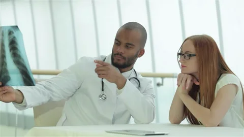 Confident doctors analyzing lung x-ray results Video stock 311810542